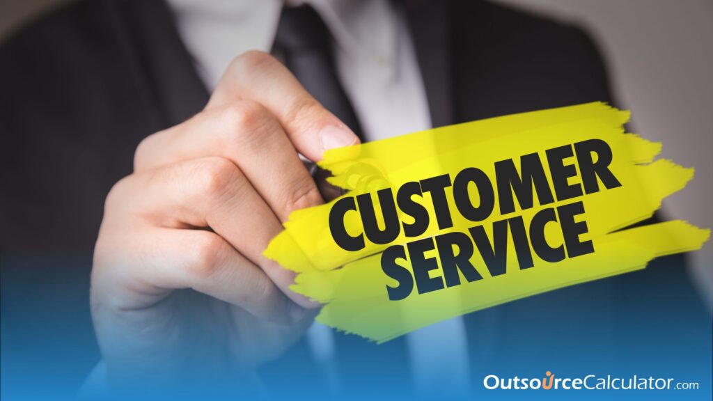 a person holding a pen and pointing the word "customer service".