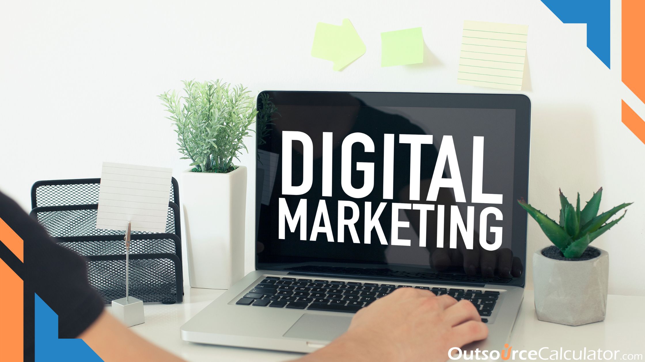 a person typing on a laptop, there is a word on laptop's screen "Digital Marketing".